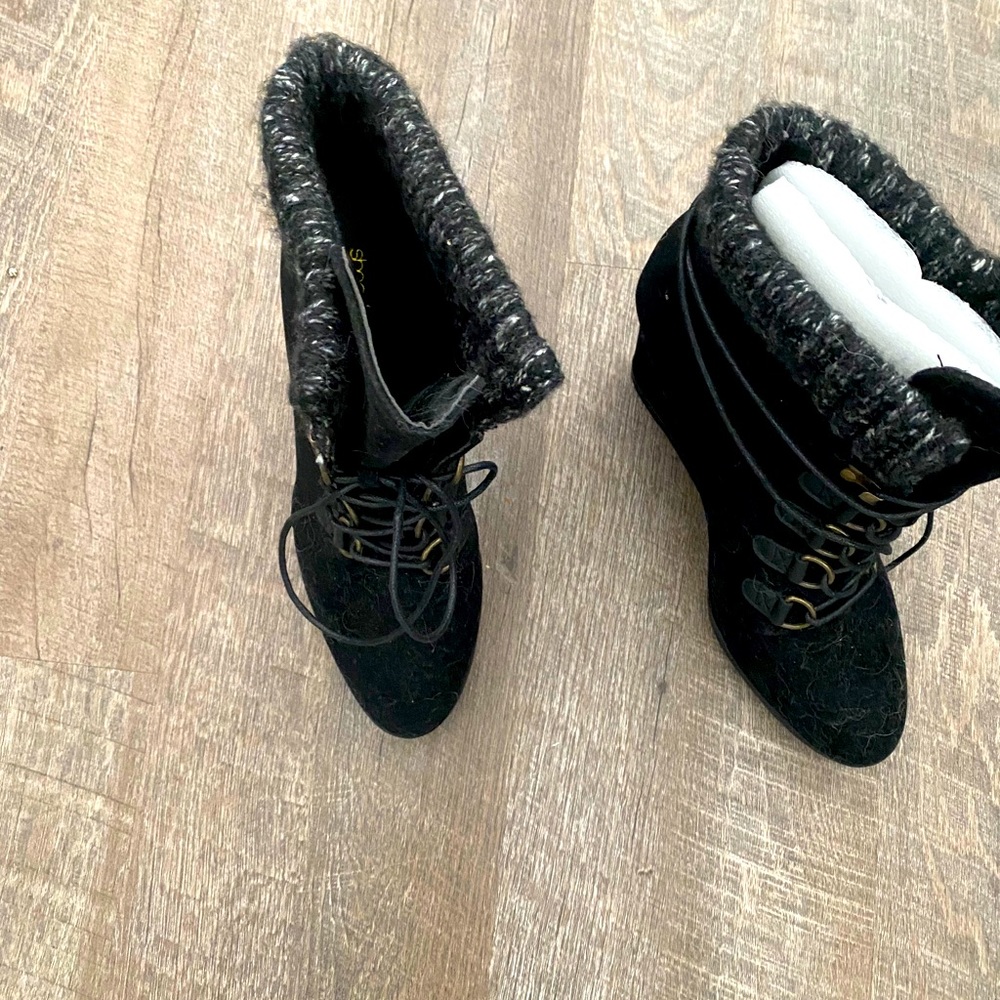 Brand new 4’ inch wedge booties. Never worn!